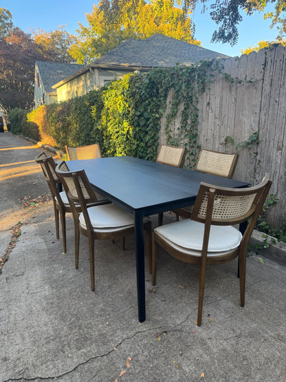 Perigold Dining Set with Black Ethnicraft Bok Oak Table 79” + Four Hands Britt Chairs Set of Six Light Wood with Cane